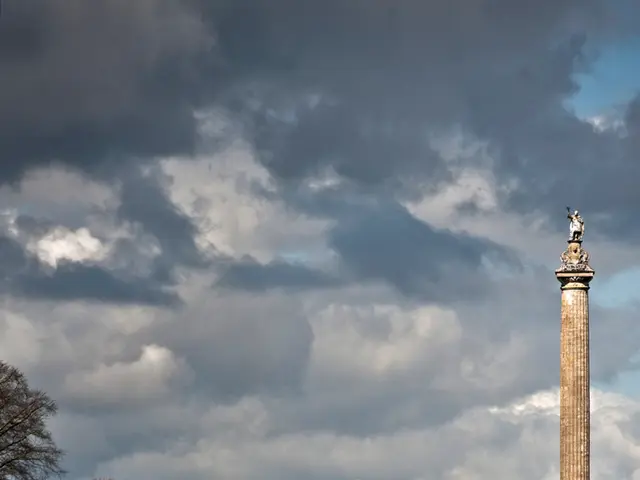 On the right side of the image there is a tower and we can see people. In the center we can see a...