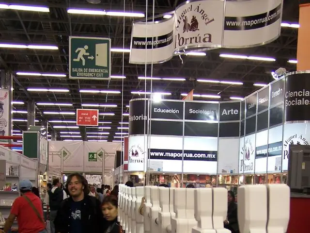 In this image there are a few people standing and walking on the floor and there are few...